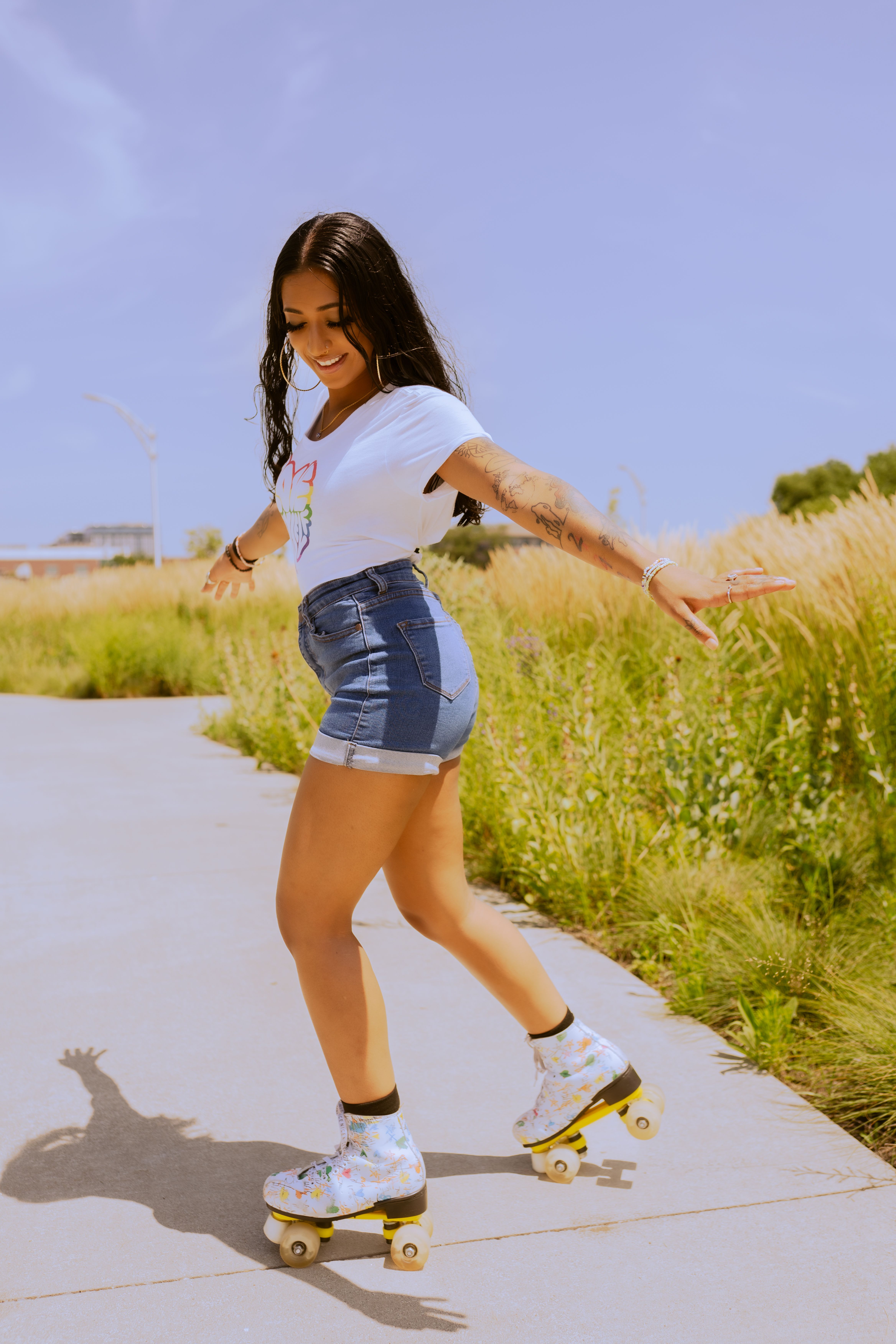 Woman in Shorts with Roller Skates on Pavement Free Stock Photo