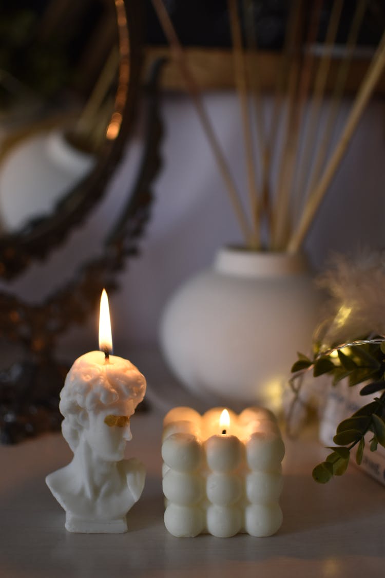 Close-Up Shot Of Burning Candles 