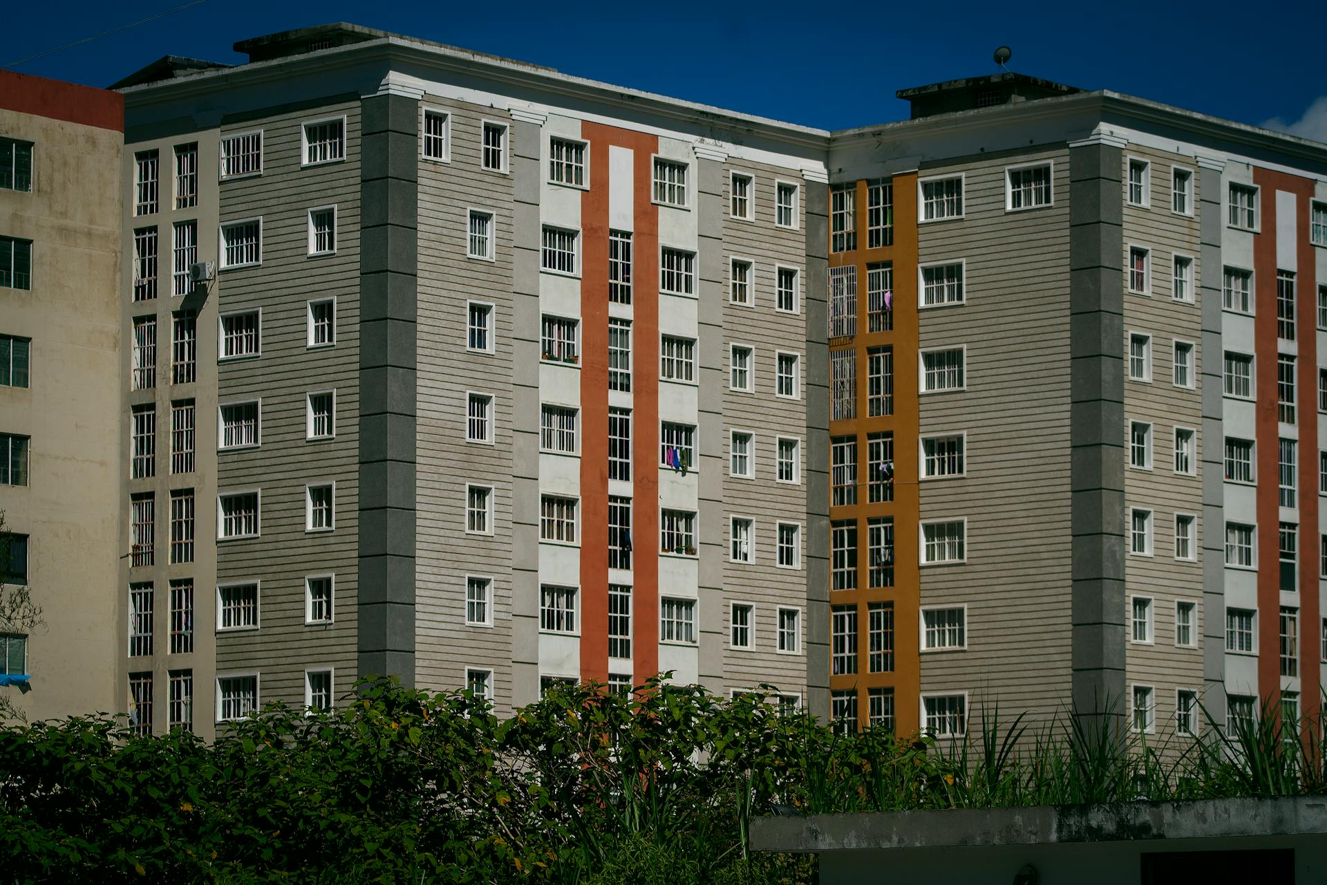 High-rise modern apartment buildings with glass windows in Venezuela, capturing architectural design.