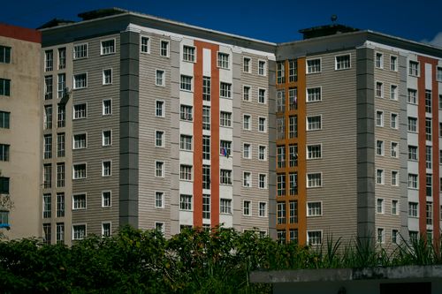 Free High-rise modern apartment buildings with glass windows in Venezuela, capturing architectural design. Stock Photo