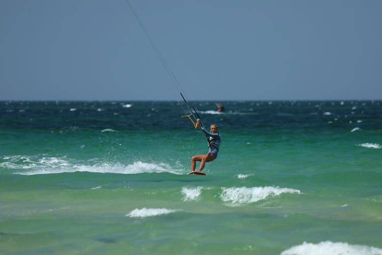 A Woman Kiteboarding