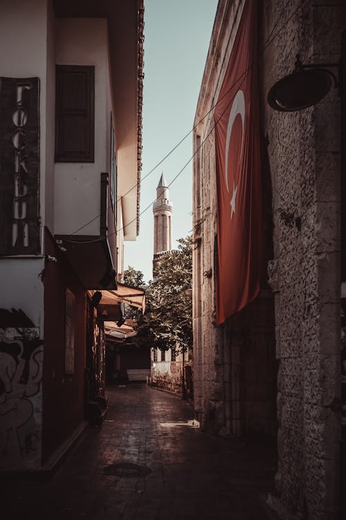 An Alley between Concrete Buildings