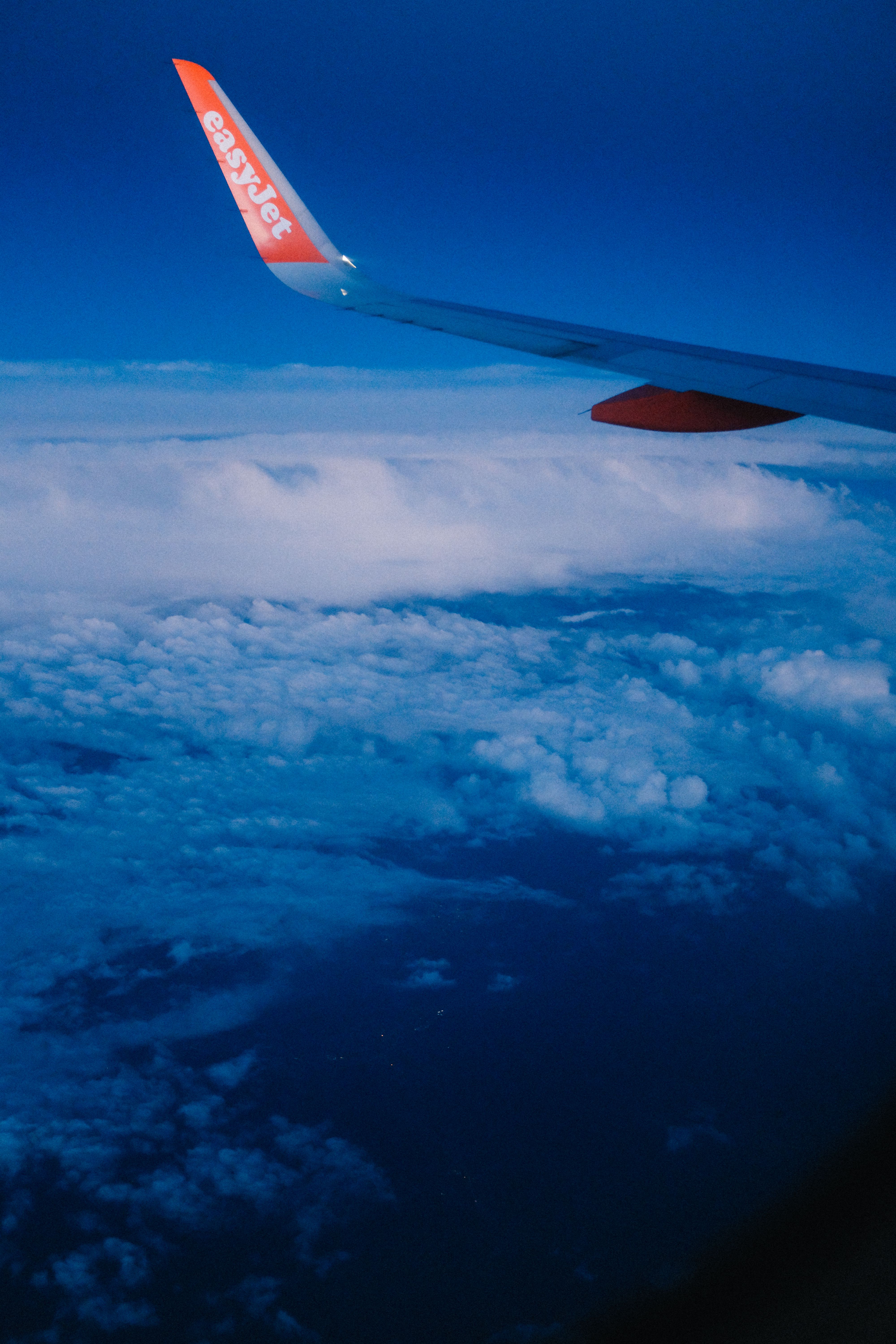 Wing of an Airplane against the Sky · Free Stock Photo