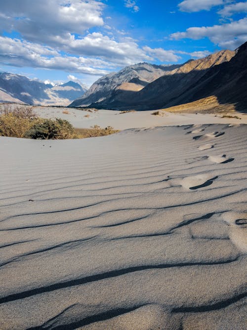 Mountains Near Desert Land with Sand Dunes