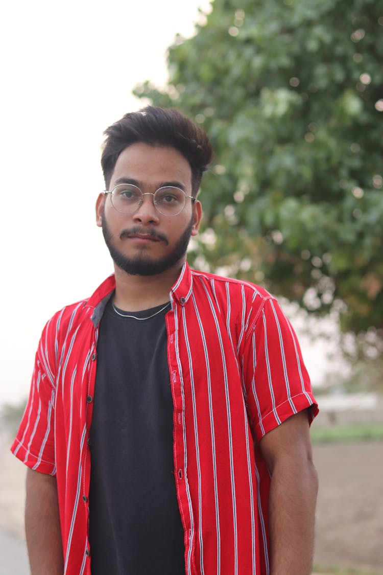 A Bearded Man In Red Shirt