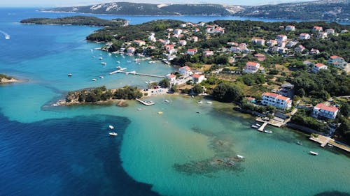 An Aerial Photography of a City Near the Body of Water