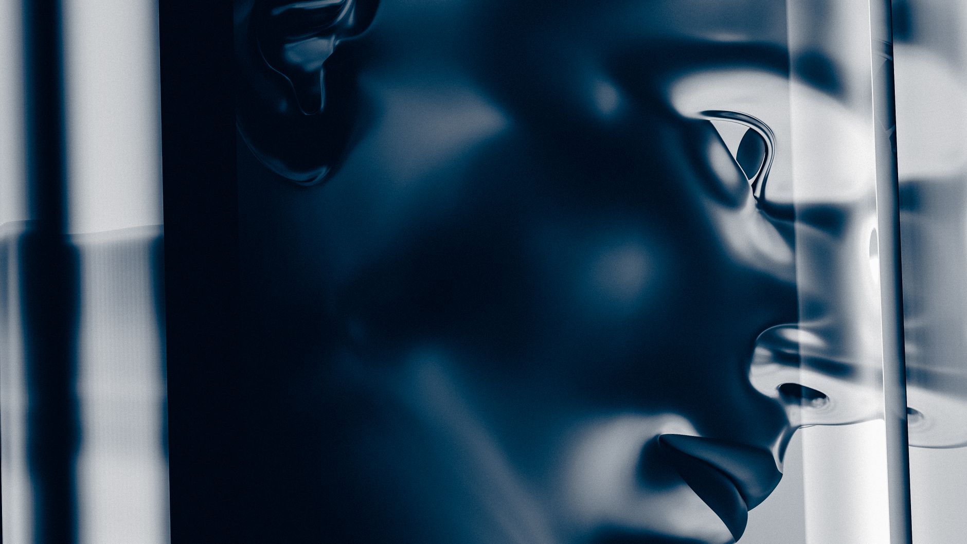 Creative abstract artwork featuring a metallic face in a dark artistic style.