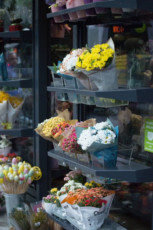 Beautiful Flower Bouquets on Stand of a Shop