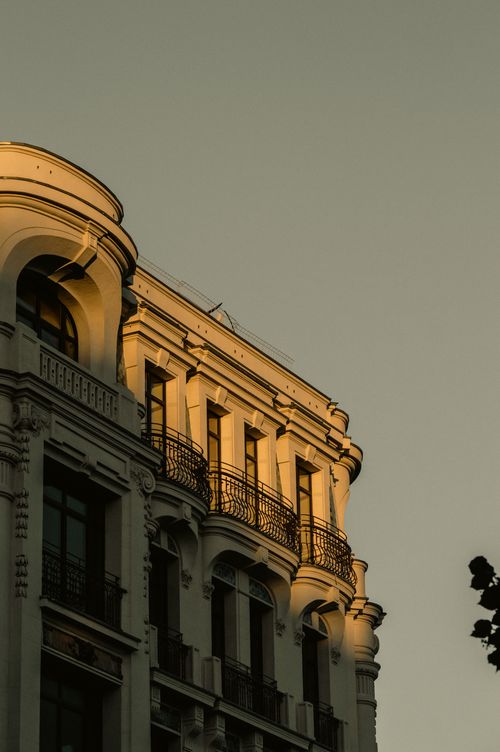 Free Low-angle view of a historic building in Istanbul, Turkey, illuminated by golden sunlight. Stock Photo