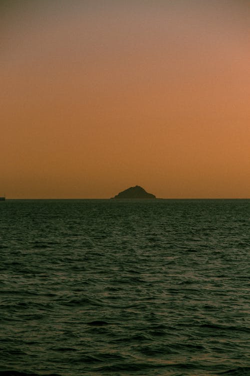 Foto profissional grátis de água, alvorecer, cair da noite