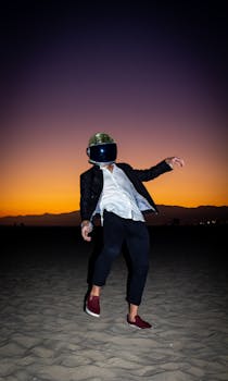 Fashionable individual in a helmet poses dramatically at sunset in the desert, blending futuristic style with natural beauty.
