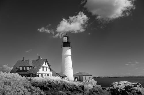 Grayscale Photo of a Lighthouse in Cape Elizabeth Maine