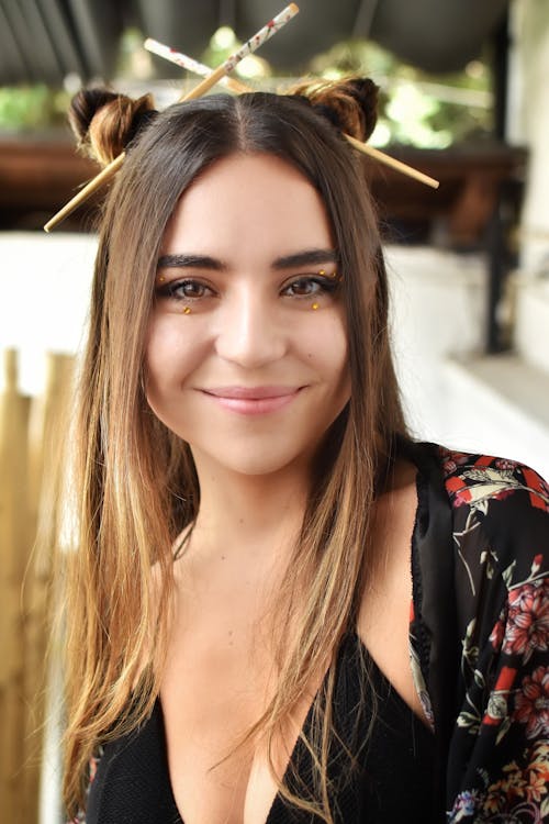 Beautiful Woman Wearing Hair Sticks