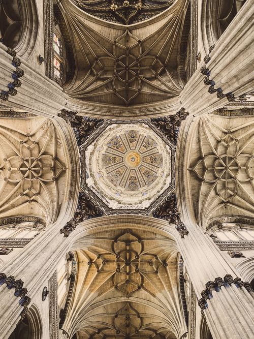 Free Stunning view of a gothic cathedral's intricate dome and arches. Stock Photo