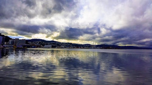 Free stock photo of by the sea, city, clouds