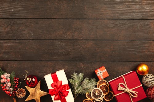 Free Christmas Gifts On Brown Parquet Floor Stock Photo