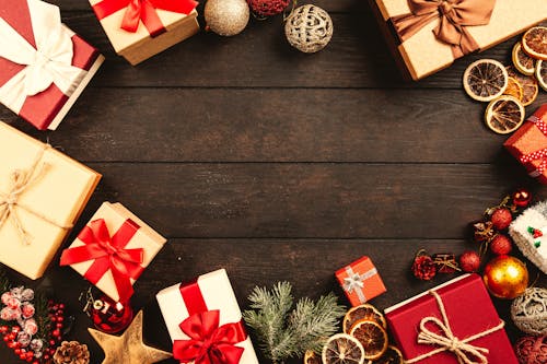 Gift Boxes On Brown Wooden Board