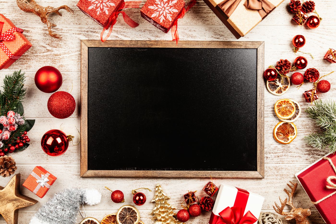 A framed chalkboard with hand-lettered text used as decor