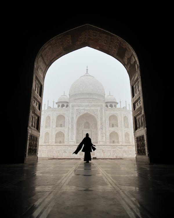 Silhouette of a Woman against Taj Mahal, India