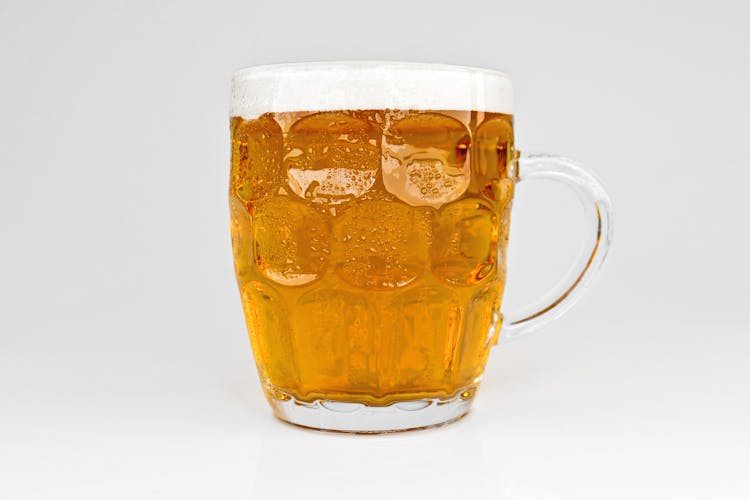 A Mug If Cold Draft  Beer In Close-up Shot