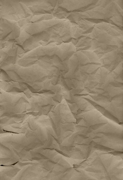 A Close-Up Shot of a Crumpled Brown Paper