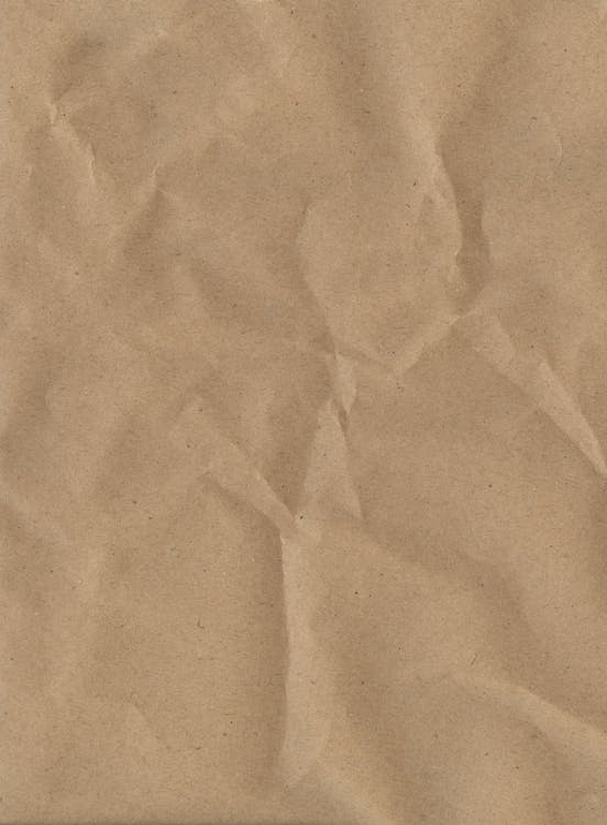 Cerca de textura de papel craft marrón para el fondo