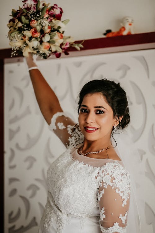 A Bride Holding Flowers