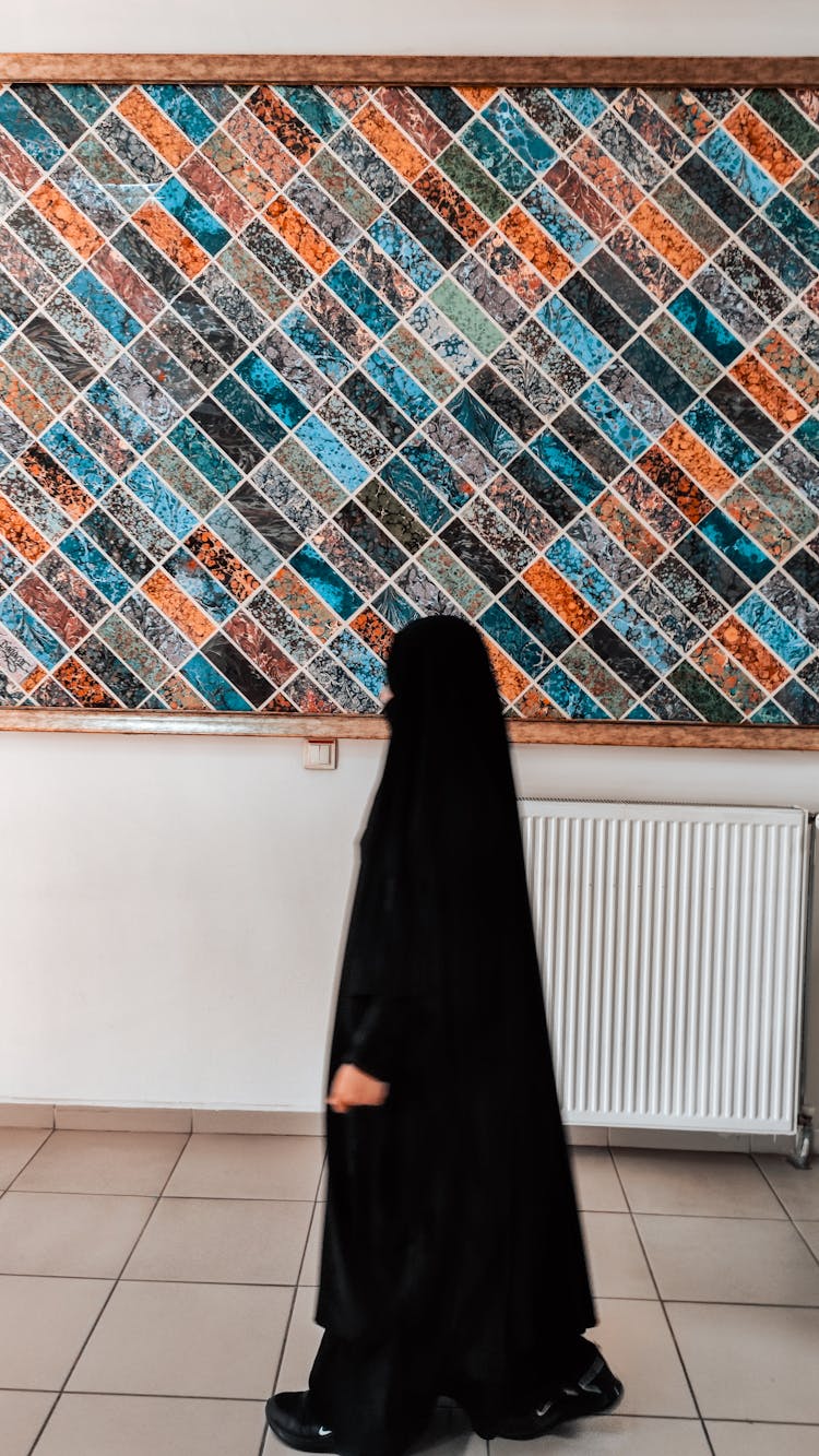 Shot Of Walking Woman Wearing Burka