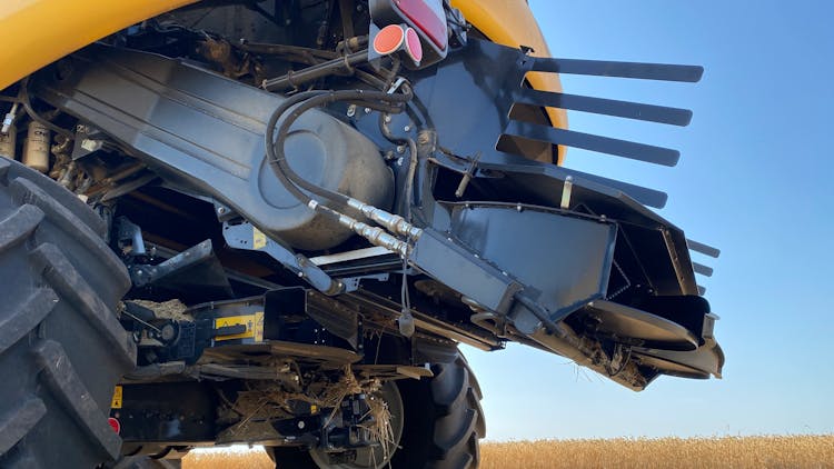 Combine Harvester On Agriculture Field