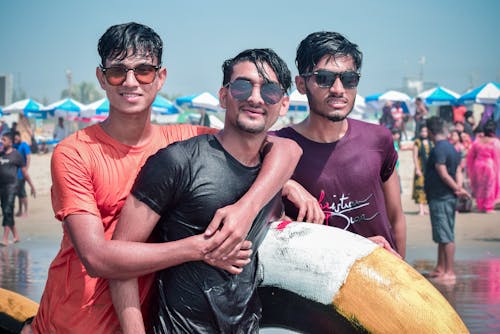 Men in Wet Shirts Wearing Sunglasses
