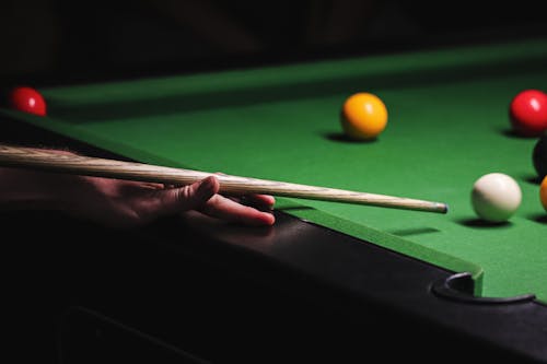 Person Playing Billiards