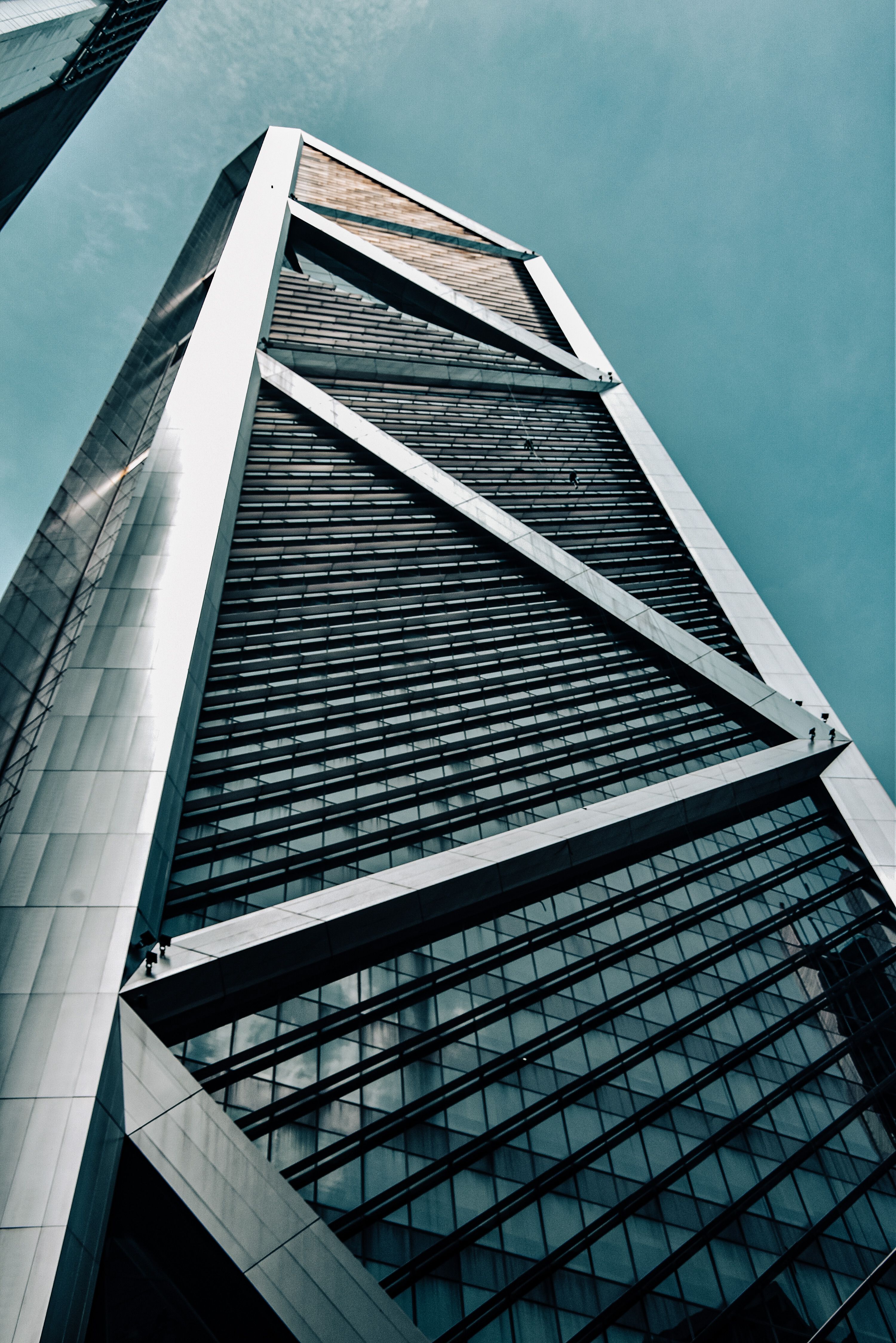 Low Angle Photography of Glass Building Under Blue Sky · Free Stock Photo