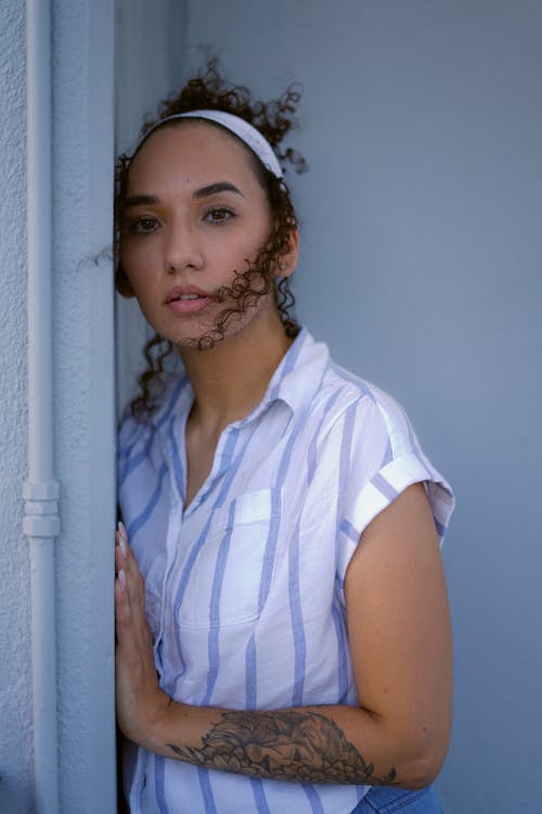 A Woman Wearing Headband with Curly Hair
