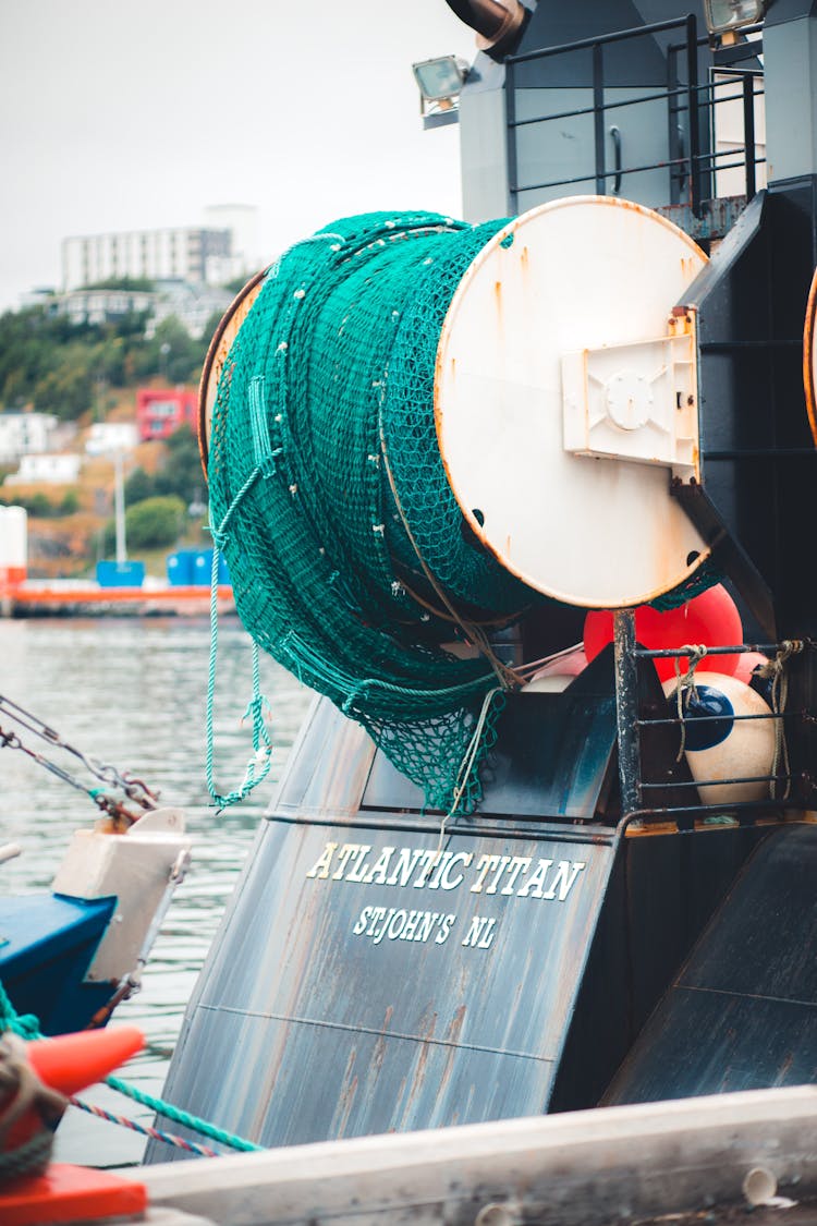 Photo Of A Rolled Fishing Net On Boat