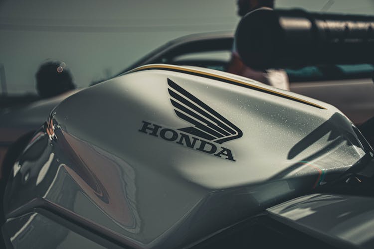 A White Motorcycle With Honda Logo 