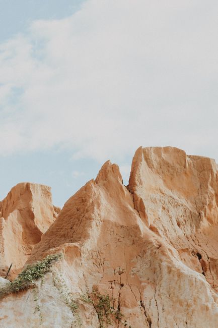 Stunning view of rocky formations under a clear sky in Canoa Quebrada, Brazil.
