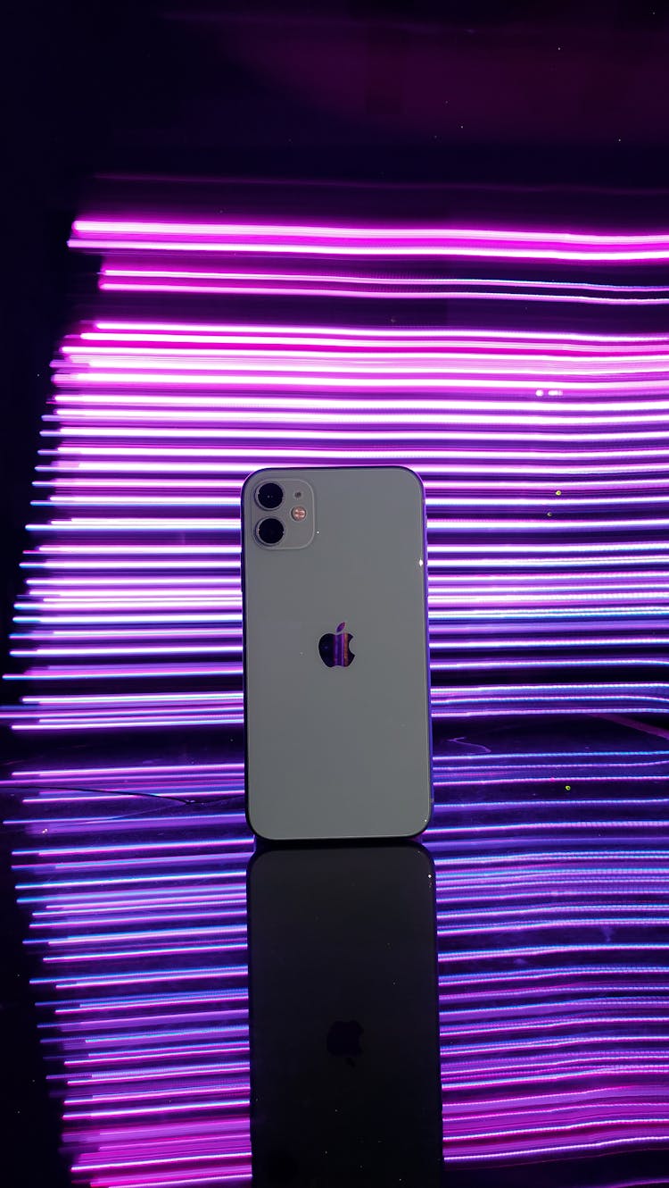 Phone Displayed On Neon Background