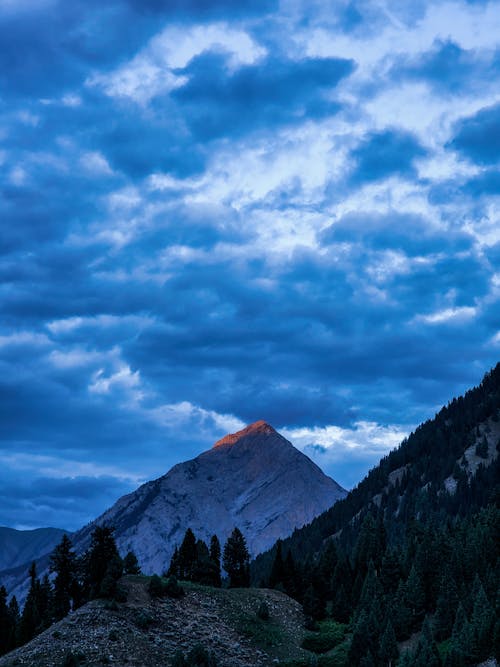 Mountains under the Cloudy Sky