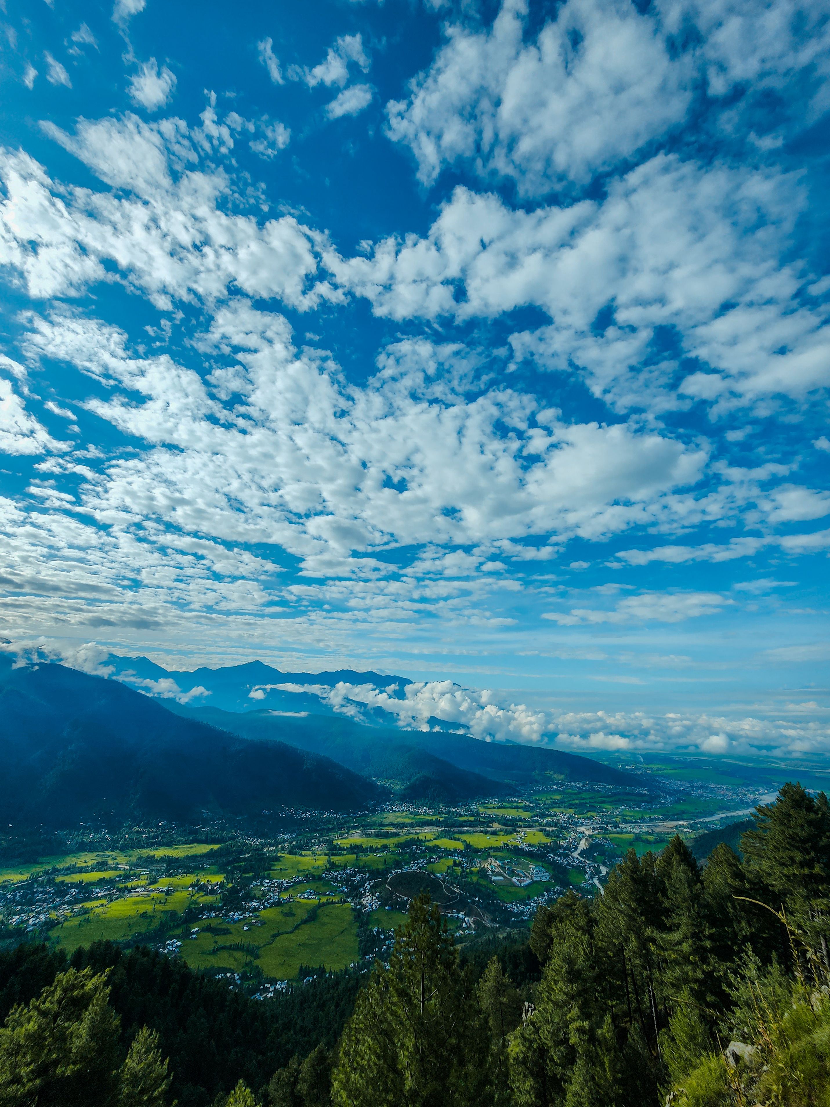 Aerial Photography of Mountains under the Cloudy Sky · Free Stock Photo