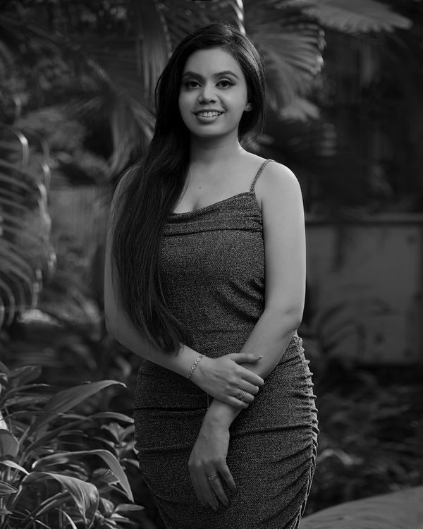 Grayscale Photo of a Beautiful Woman in Sleeveless Dress · Free Stock Photo