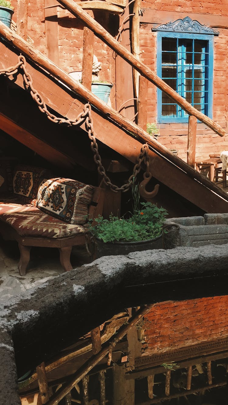 Outdoor Wooden Staircase On An Old Building