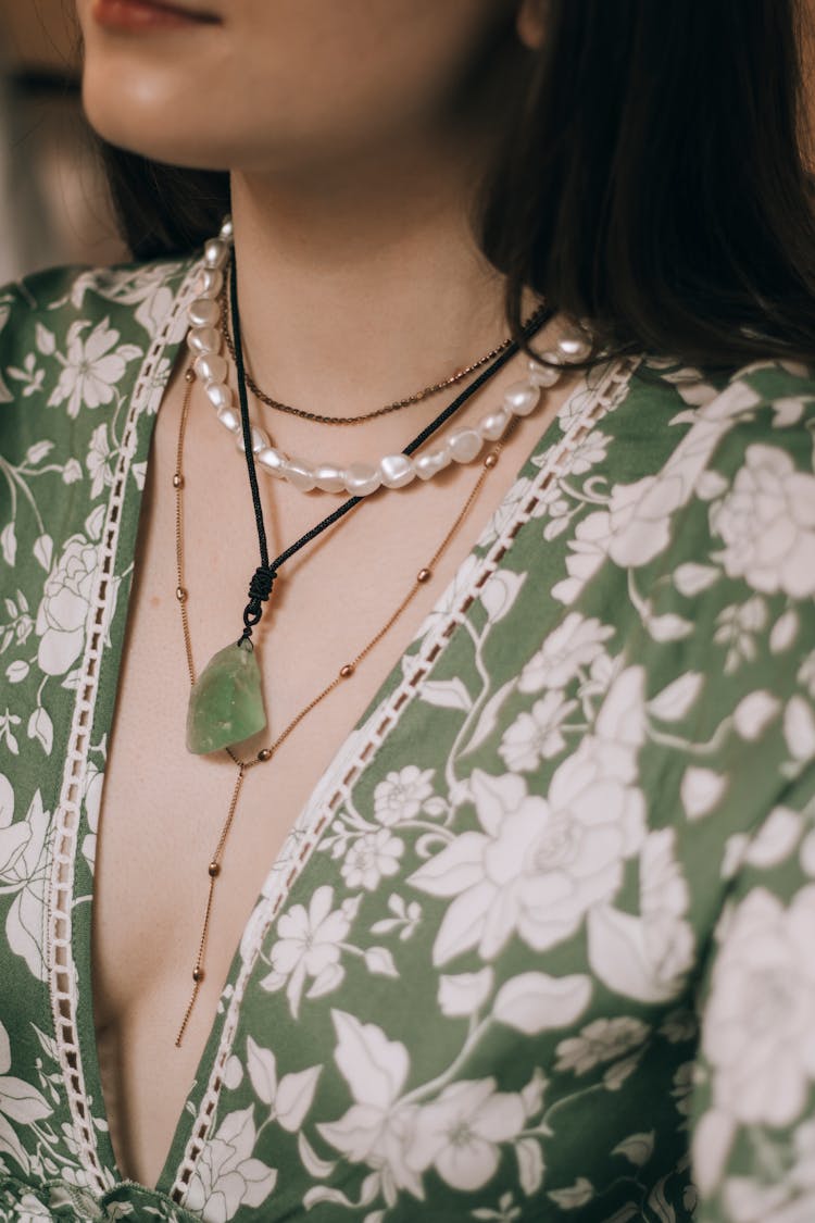 Woman Wearing Crystal Jewelry On Neck