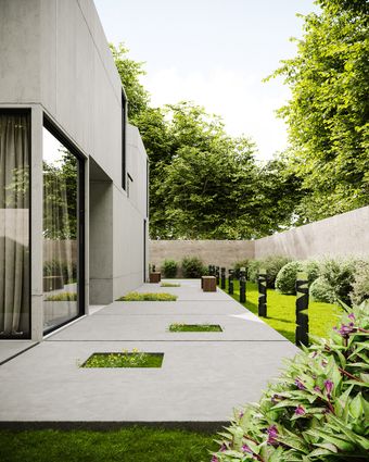 Concrete house with a green courtyard, by Bilal Mansuri on Pexels