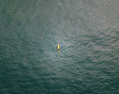 High Angle Shot of a Boat in the Sea