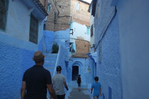 Blue alleys at dawn with a photographer — Chefchaouen