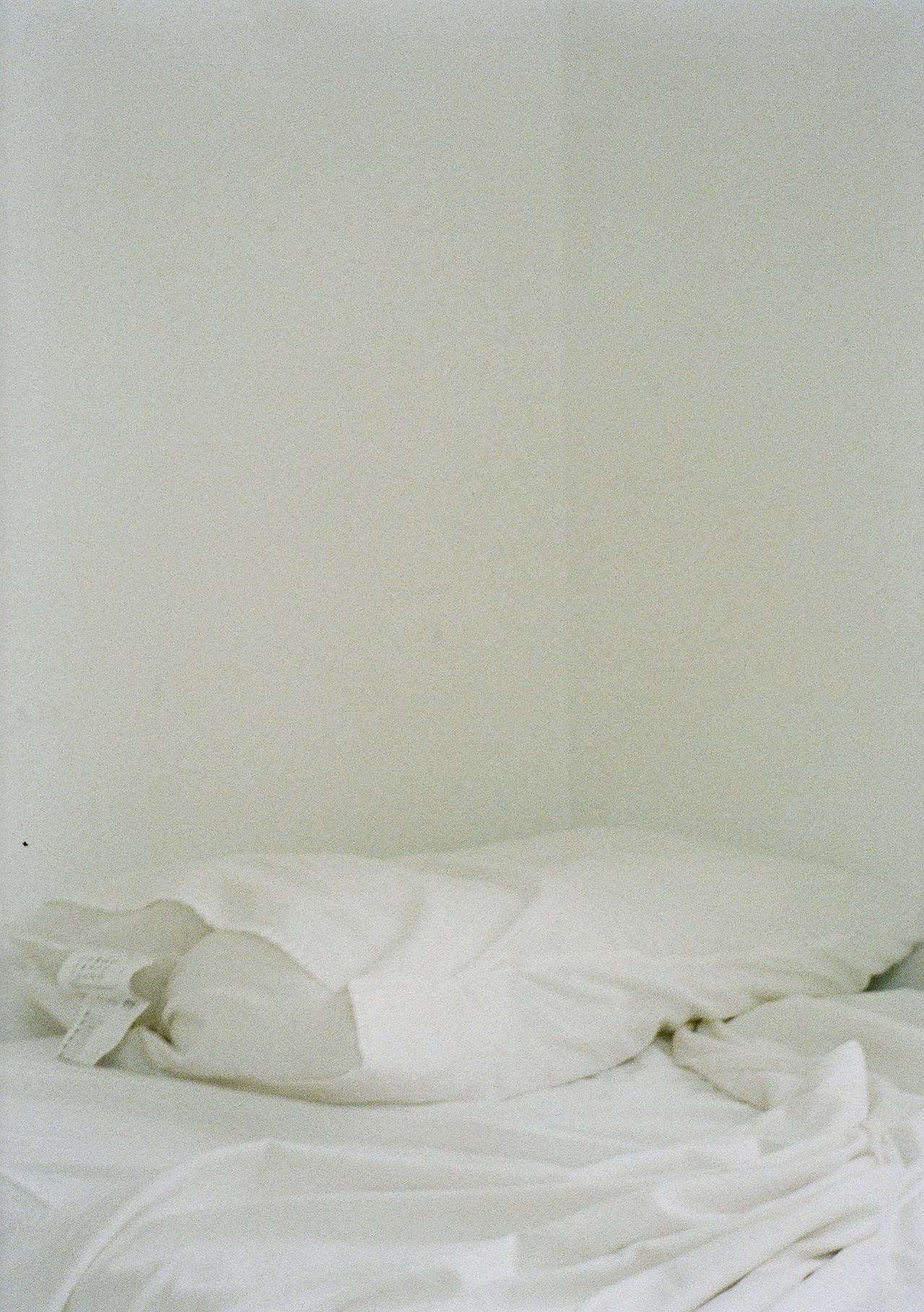 Close-up of soft rumpled white bedding