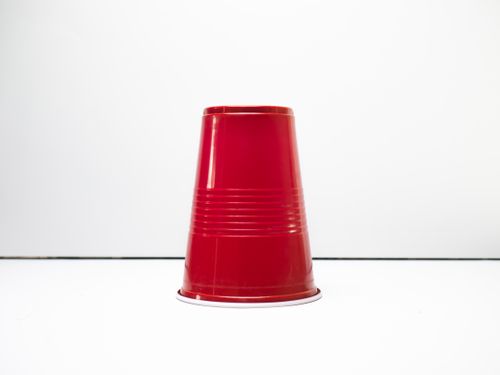 Free Red solo cup on a white background, perfect for parties and events. Stock Photo