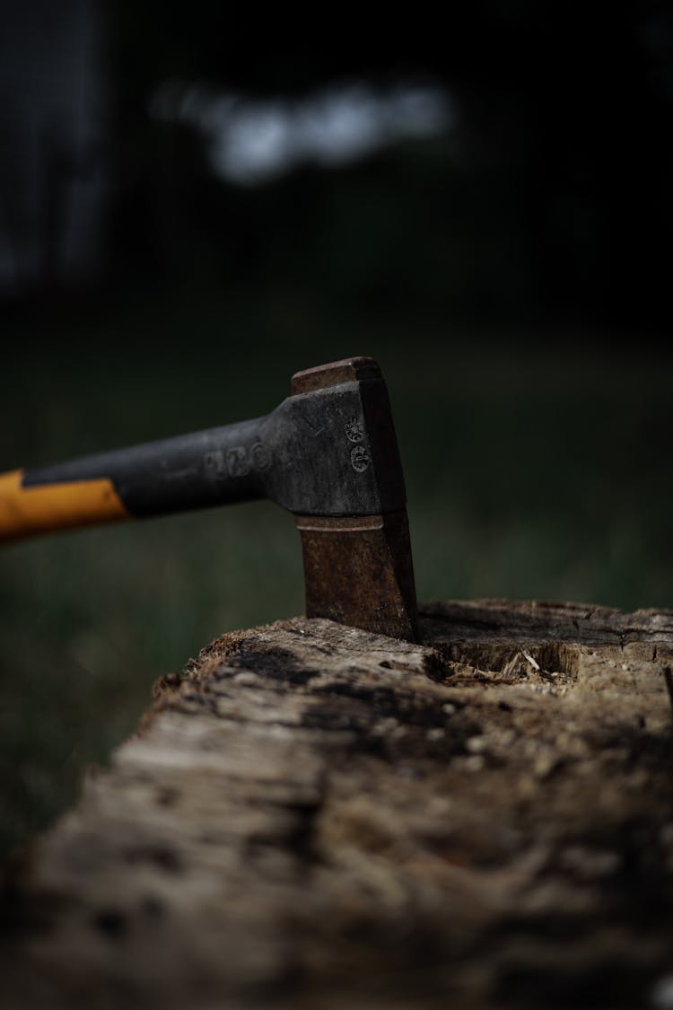 A Hatchet On A Wood 