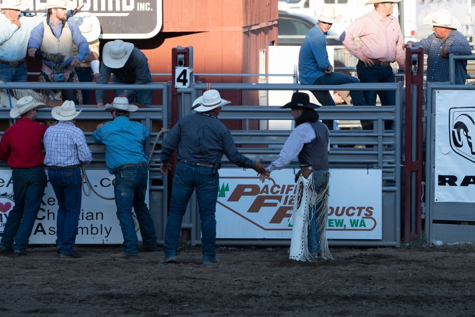 handshake over fence