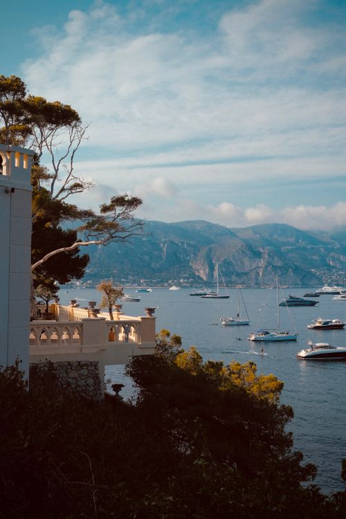 Free Beautiful view of yachts and Mediterranean coastline from Saint-Jean-Cap-Ferrat, France. Stock Photo